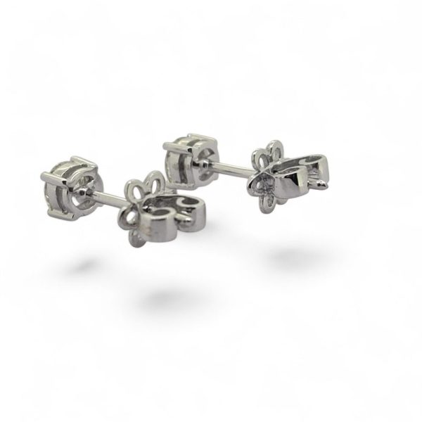 Diamond Solitaire Stud Earrings, 0.62 carats, Single stone round brilliant-cut diamonds are four-claw set and mounted in 18ct white gold