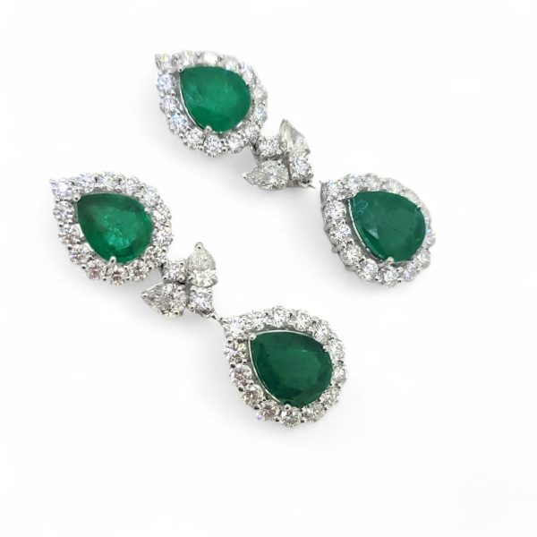 9.24ct Pear Cut Emerald and Diamond Double Cluster Drop Earrings, pear cut emerald and diamond cluster tops suspend pear cut emerald and diamond cluster drop pendants via diamond leaf links in 18ct white gold