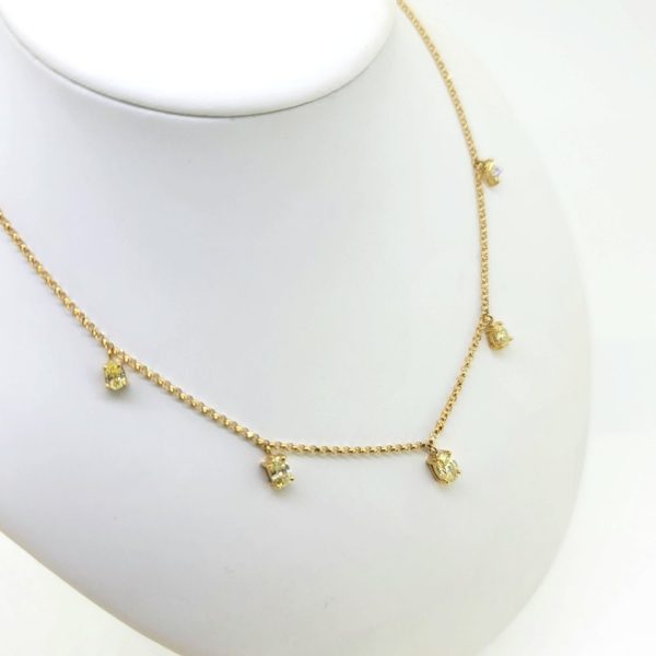 Fancy Yellow Diamond Set Gold Chain Necklace, 1.18 carats, Five fancy yellow diamonds suspended on an 18ct yellow gold chain necklace 45.5cm length