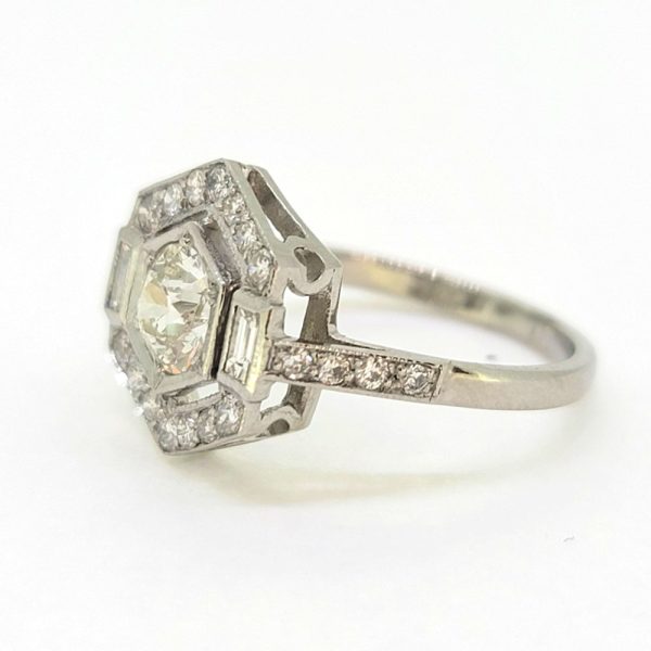 Hexagonal Diamond Cluster Engagement Ring in Platinum, 1.15 carats, 0.75ct diamond surrounded by fixed border of brilliant-cut diamonds with baguette-cut diamonds to each side