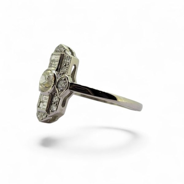 Art Deco Diamond Cluster Tablet Plaque Ring in Platinum, old-cut diamond set central to a line of baguette diamonds all within sparkling diamond surround