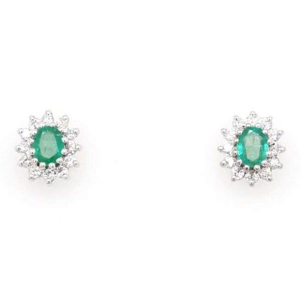 0.60ct Oval Emerald and Diamond Cluster Stud Earrings, 0.60cts oval-cut emeralds surrounded by 0.35cts sparkling round brilliant-cut diamonds in 18ct gold