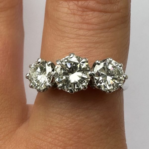 Vintage three stone diamond engagement ring