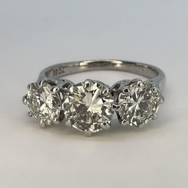 Vintage three stone diamond engagement ring