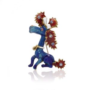 Whimsical poodle enamel brooch in gold with sapphires and rubies.