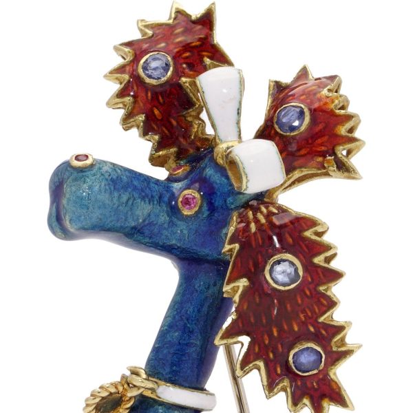 Whimsical poodle enamel brooch in gold with sapphires and rubies.