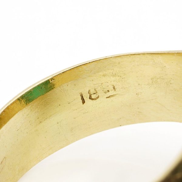 Vintage emerald dome ring in gold.