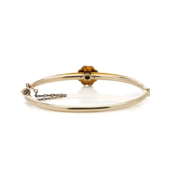 Victorian gold bangle with pearls and old cut diamond.