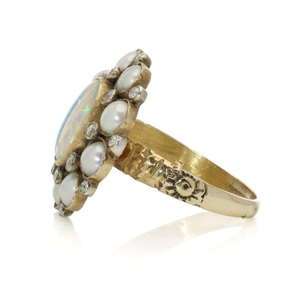 Vintage gold cluster ring with opal, pearls and diamonds.