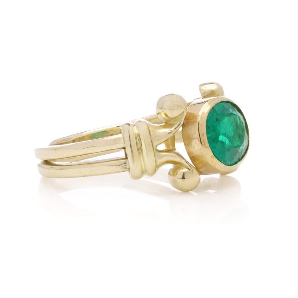 Theo Fennell emerald ring in yellow gold.