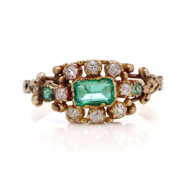 Victorian emerald and diamond cluster ring in gold.