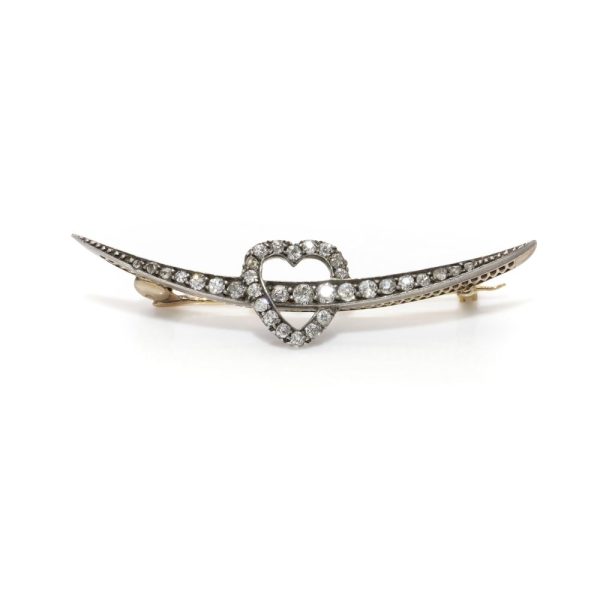 Victorian heart and arrow diamond brooch in gold and silver.