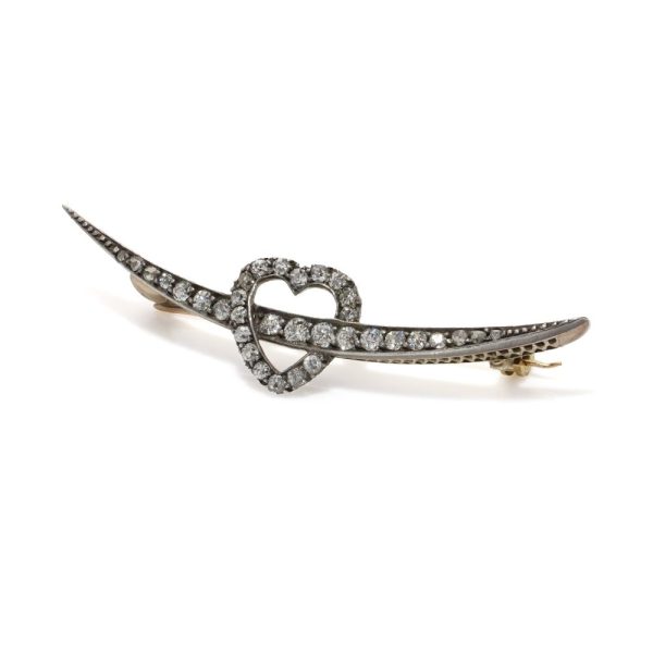 Victorian heart and arrow diamond brooch in gold and silver.