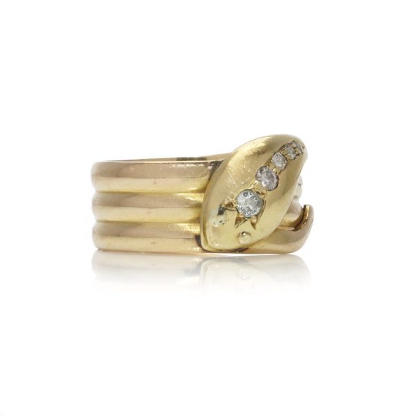 Antique gold snake ring with old cut diamonds.