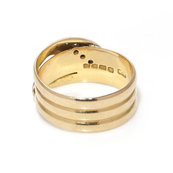 Antique gold snake ring with old cut diamonds.