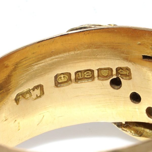 Antique gold snake ring with old cut diamonds.