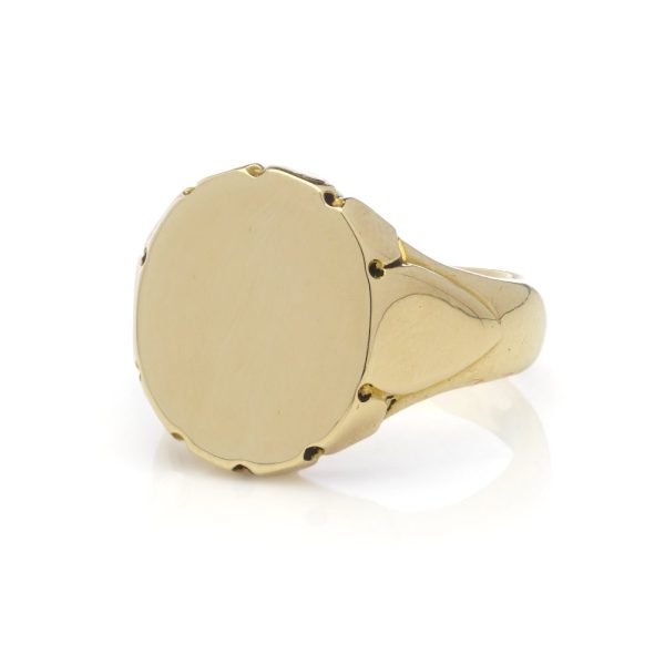 Plain gold signet ring.