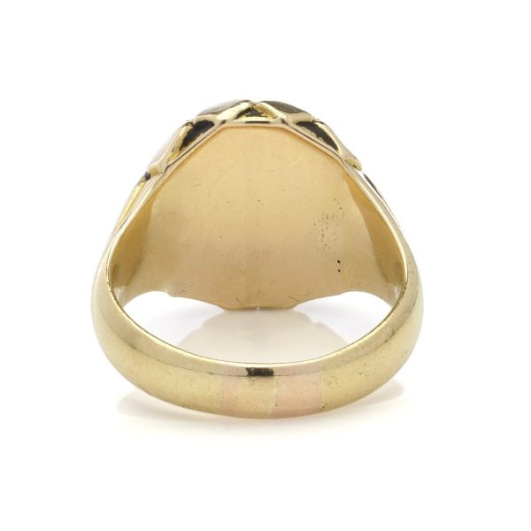 Plain gold signet ring.
