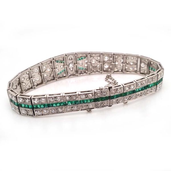 Art Deco 5ct Old Cut Diamond and Emerald Bracelet in Platinum, 5cts of old European transitional-cut diamonds accented with fine baguette-cut and French-cut emeralds