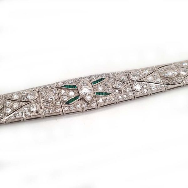 Art Deco 5ct Old Cut Diamond and Emerald Bracelet in Platinum, 5cts of old European transitional-cut diamonds accented with fine baguette-cut and French-cut emeralds