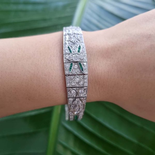 Art Deco 5ct Old Cut Diamond and Emerald Bracelet in Platinum, 5cts of old European transitional-cut diamonds accented with fine baguette-cut and French-cut emeralds