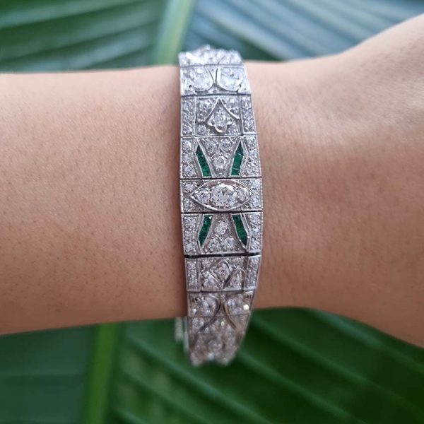 Antique Early Art Deco 5ct Old Cut Diamond and Emerald Bracelet in Platinum, 5cts of old European transitional-cut diamonds accented with fine baguette-cut and French-cut emeralds, Circa 1915