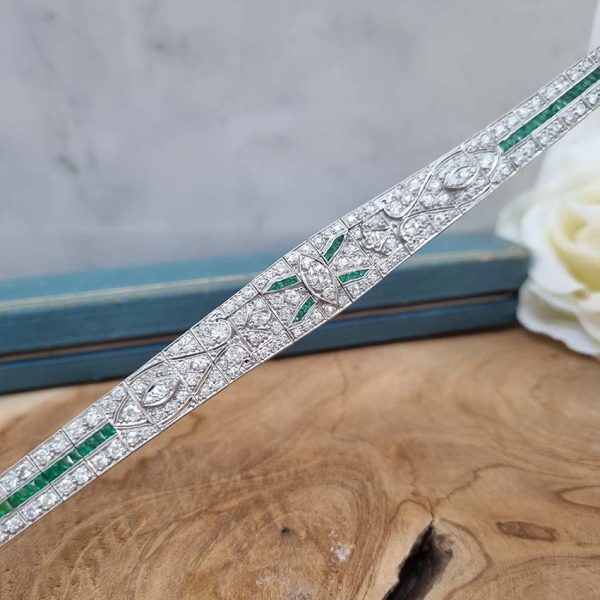 Antique Early Art Deco 5ct Old Cut Diamond and Emerald Bracelet in Platinum, 5cts of old European transitional-cut diamonds accented with fine baguette-cut and French-cut emeralds, Circa 1915