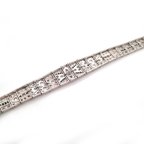Art Deco 5ct Old Cut Diamond and Emerald Bracelet in Platinum, 5cts of old European transitional-cut diamonds accented with fine baguette-cut and French-cut emeralds