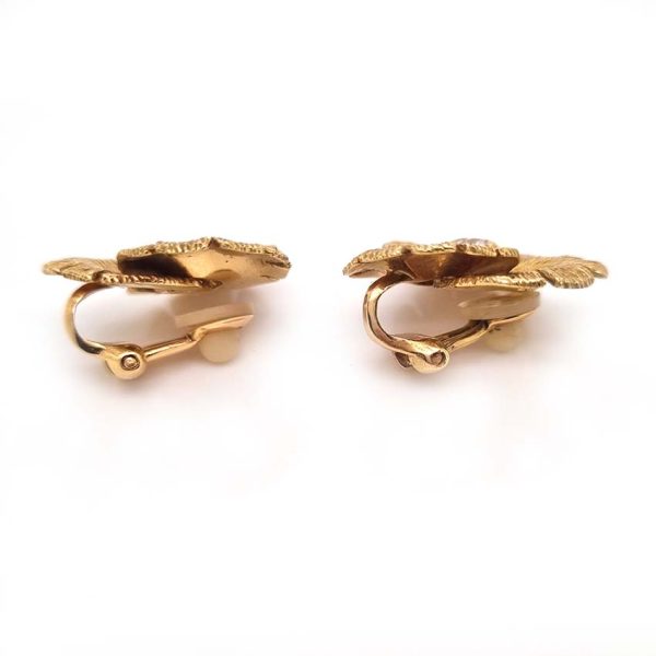 Vintage 1.20ct Diamond Gold Trefoil Flower Clip Earrings, 1.20 carats old European transitional cut diamonds within textured 18ct yellow gold trefoil concentric design and softening stylised petals. Circa 1960s