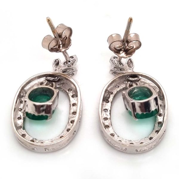 Vintage 1.7ct Emerald and Diamond Oval Cluster Drop Earrings, 7.14ct oval emerald pendant drops within fixed oval diamond-set halo surrounds from diamond fleur-de-lis tops in 18ct white gold