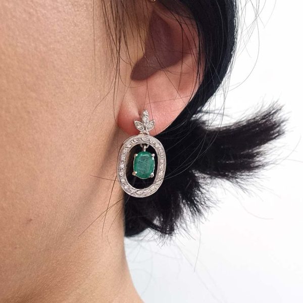 Vintage 1.7ct Emerald and Diamond Oval Cluster Drop Earrings, 7.14ct oval emerald pendant drops within fixed oval diamond-set halo surrounds from diamond fleur-de-lis tops in 18ct white gold