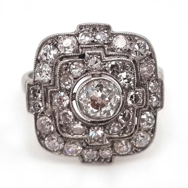 Art Deco Old Cut Diamond Cluster Dress Ring in Platinum, 1.70 carats old mine-cut diamonds and eight-cut diamonds in geometric design. Circa 1920