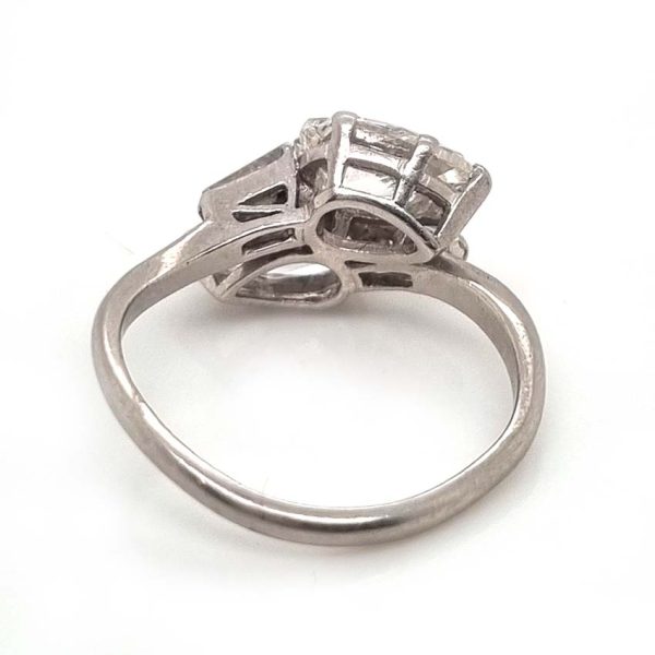 Art Deco Pear Diamond Toi et Moi Crossover Engagement Ring in Platinum, antique diamond two stone ring, Two pear-shaped diamonds lead to tapered baguette diamonds