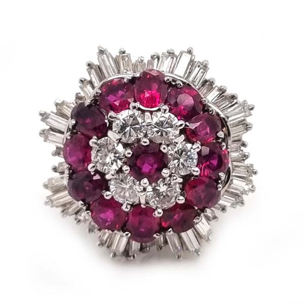 Vintage 6.5ct Ruby and Diamond Ballerina Cluster Cocktail Ring, 6.50 carats Siamese rubies surrounded by 2.50 carats of brilliant-cut diamonds within outer ballerina waved skirt border of 1.50 carats Baguette-cut diamonds in platinum. Circa 1960s