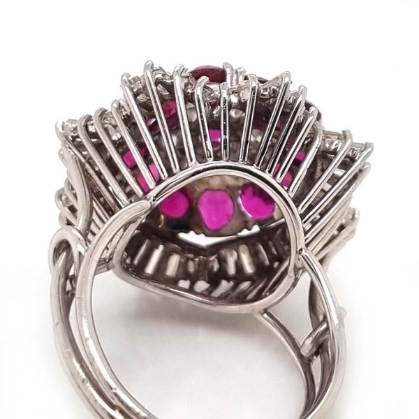 Vintage 6.5ct Ruby and Diamond Ballerina Cluster Cocktail Ring, 6.50 carats Siamese rubies surrounded by 2.50 carats of brilliant-cut diamonds within outer ballerina waved skirt border of 1.50 carats Baguette-cut diamonds in platinum. Circa 1960s