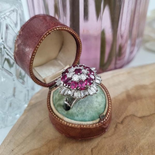 Vintage 6.5ct Ruby and 4ct Diamond Ballerina Cluster Cocktail Ring in Platinum, 6.50 carats Siamese rubies surrounded by 2.50 carats of brilliant-cut diamonds within outer ballerina waved skirt border of 1.50 carats Baguette-cut diamonds