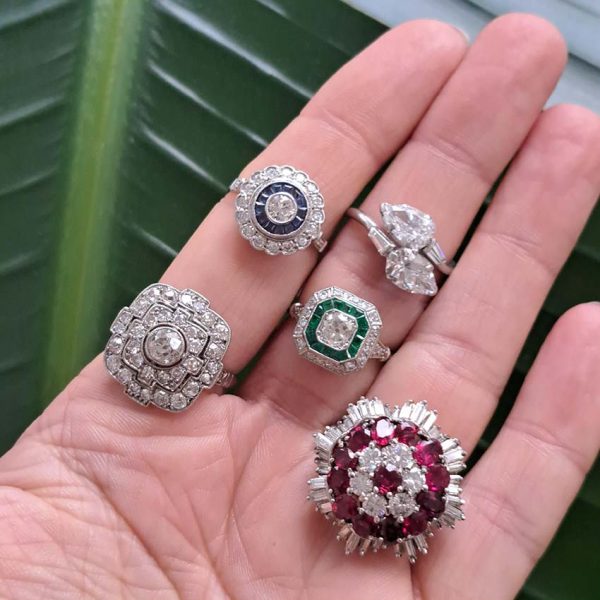 Vintage 6.5ct Ruby and Diamond Ballerina Cluster Cocktail Ring, 6.50 carats Siamese rubies surrounded by 2.50 carats of brilliant-cut diamonds within outer ballerina waved skirt border of 1.50 carats Baguette-cut diamonds in platinum. Circa 1960s
