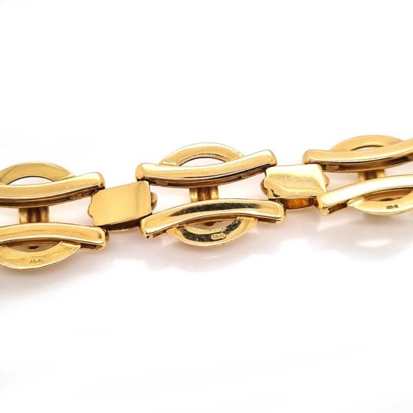 Vintage 18ct Yellow Gold Fancy Link Bracelet by Deakin and Francis, eye-catching circular and strap link design. Made by Deakin and Francis, Birmingham 1960