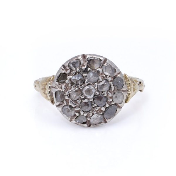 Victorian diamond cluster ring in gold and silver.