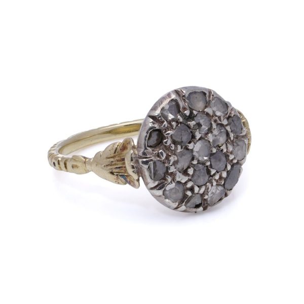 Victorian diamond cluster ring in gold and silver.