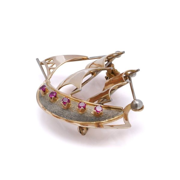 Gold sailing ship brooch with rubies.