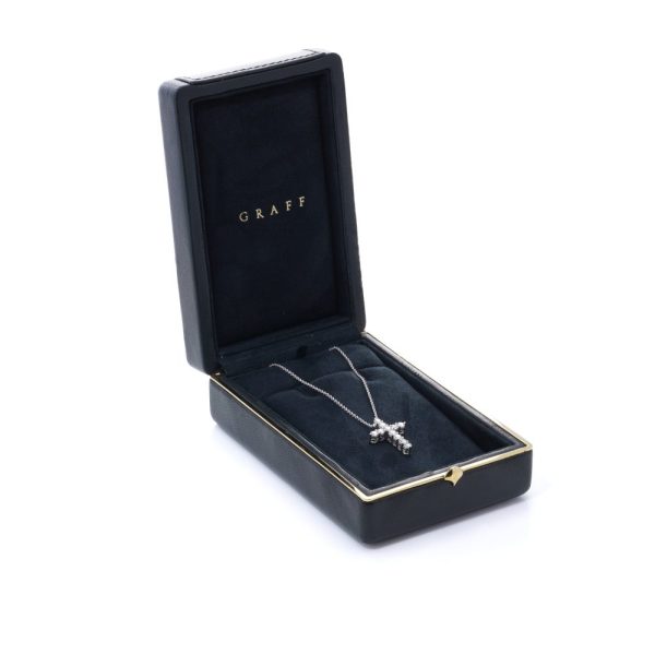 Diamond cross pendant in white gold.