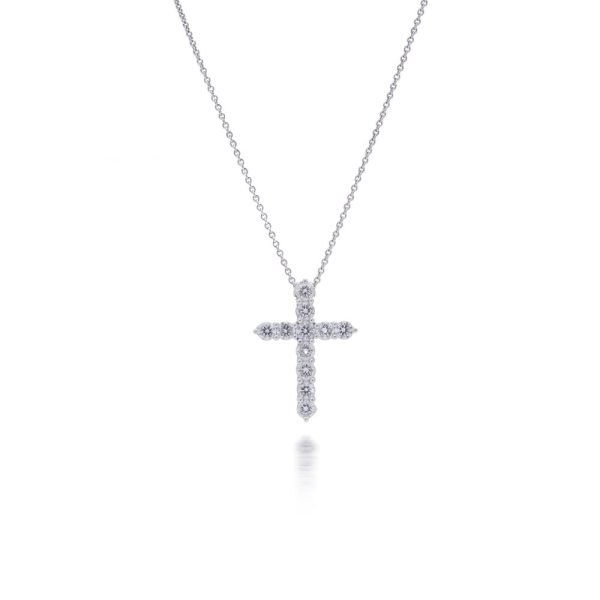 Diamond cross pendant in white gold.