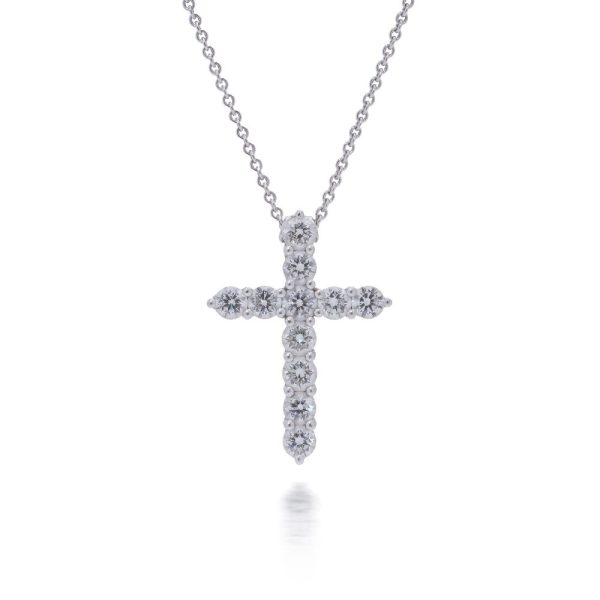 Diamond cross pendant in white gold.