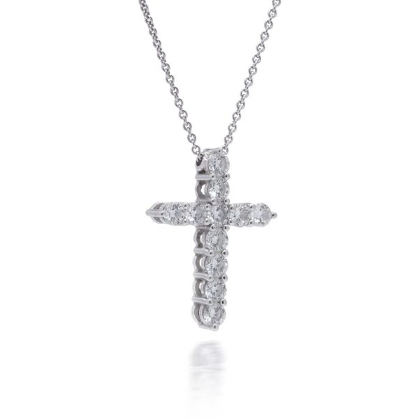 Diamond cross pendant in white gold.