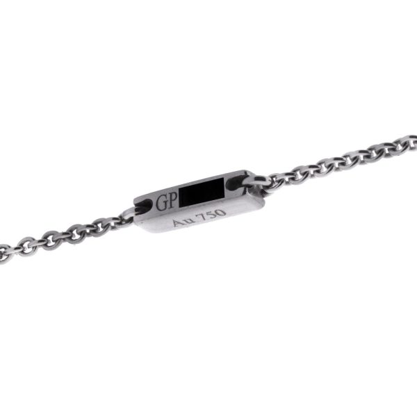 Diamond cross pendant in white gold.