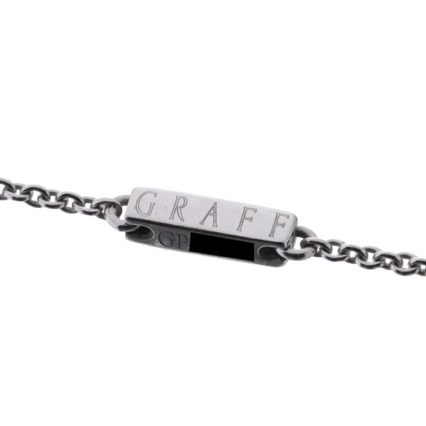 Diamond cross pendant in white gold.