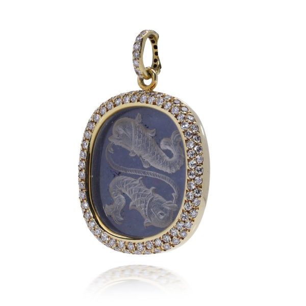 Gold pendant with diamonds.