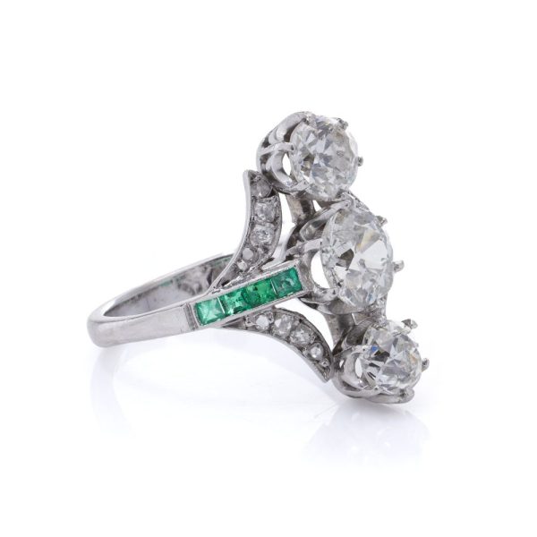 Diamond and emerald ring in platinum.
