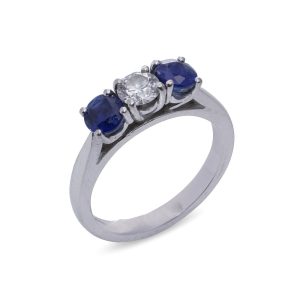 Vintage diamond and sapphire three stone ring in platinum.